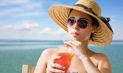 Woman sipping Ice Tea