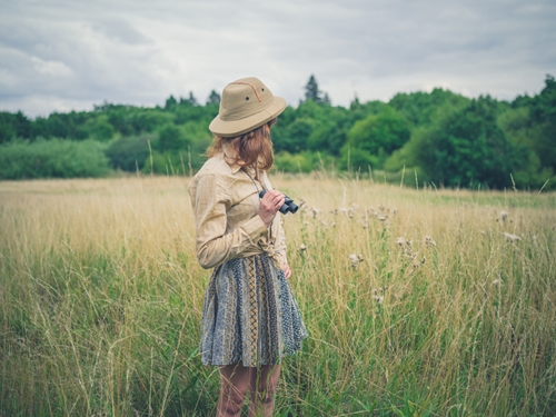 Lady exploring fields near The Macleay Hotel in Potts Point