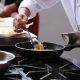 Chef cooking at Restaurant at The Macleay Hotel in Sydney